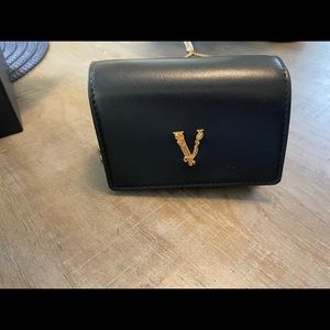 Authentic Versace purse Worn once too small no trades